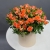 Композиция в шляпной коробке из оранжевых кустовых роз в Краснознаменске