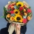 Букет "Ричи" из подсолнухов, альстромерий, гиперикума, роз, скиммии и диантусов в Краснознаменске
