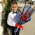 Букет из 5 красных гладиолусов в синей упаковке в Краснознаменске