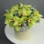 Композиция в шляпной коробке из 11 лаймовых орхидей в Краснознаменске