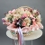 Композиция в корзине "Диодора" из французских роз Квиксенд, диантусов и кустовых пионовидных роз Бомбастик в Краснознаменске